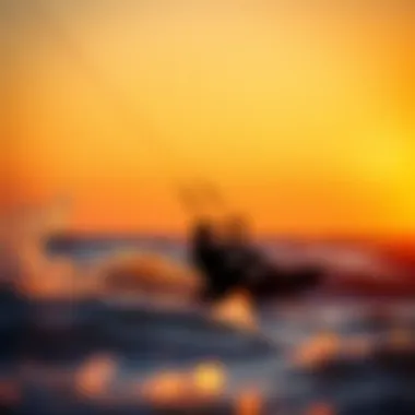 Kiteboarding at Sunset Kiteboarder gliding through the waves at sunset.