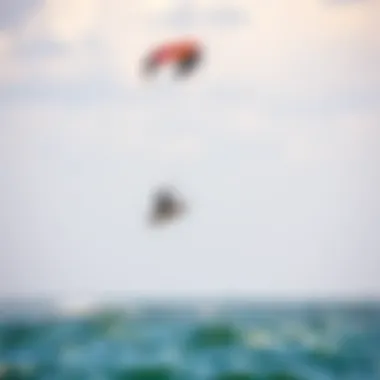 A vibrant kite soaring above the water during a kiteboarding session
