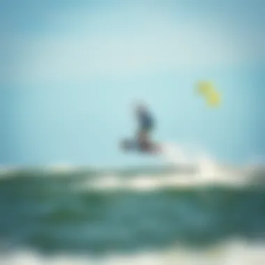 A kiteboarder executing an impressive jump over waves