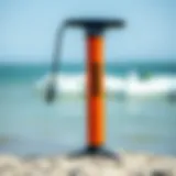 Detailed view of the Naish kite pump showcasing its ergonomic design
