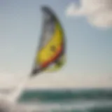 A close-up view of a Naish kitesurfing kite soaring through the sky