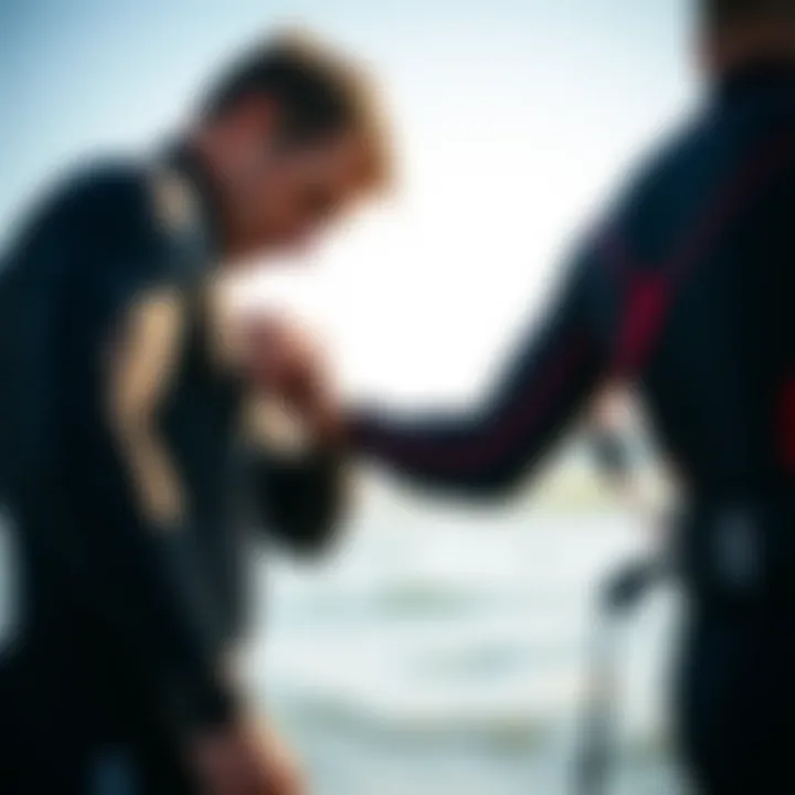 Kiteboarder examining wet suit fit