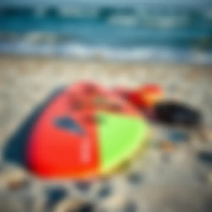 Beginner wing foiling gear laid out on the beach
