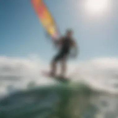 Dynamic Kiteboarding Experience Kiteboarder gliding through waves with a vibrant kite