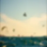 Vast ocean view with kiteboarders in action