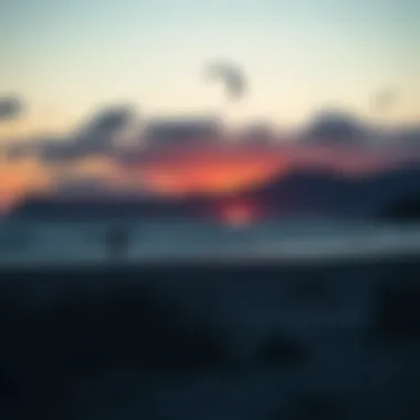 A serene sunset over the kiteboarding beach