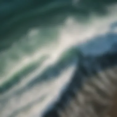 Aerial view of waves crashing on the shore