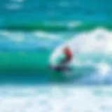 A kiteboarder gracefully riding a wave