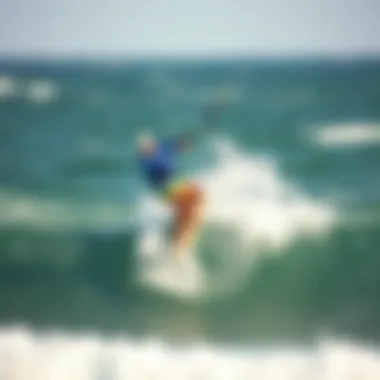 Aerial Trick by Kiteboarder on Wave A kiteboarder performing a trick on a wave