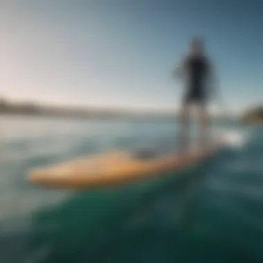 A dynamic view of a foiling SUP board gliding over water