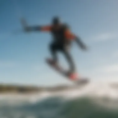 Kiteboard soaring through strong winds above a scenic landscape