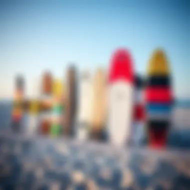 Different kiteboard sizes displayed on a beach
