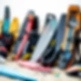 Diverse Selection of Kiteboarding Equipment A variety of used kiteboarding gear displayed on a beach