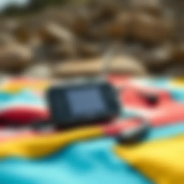 Beach Ready Audio Solution Close-up of waterproof MP3 player on a beach towel