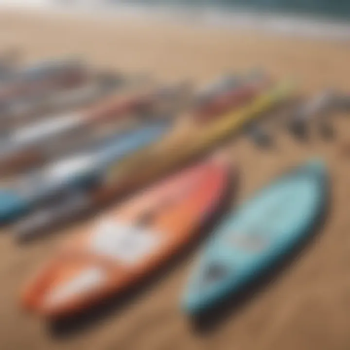 An array of windsurfing equipment laid out on a sandy beach, highlighting the diversity of gear available